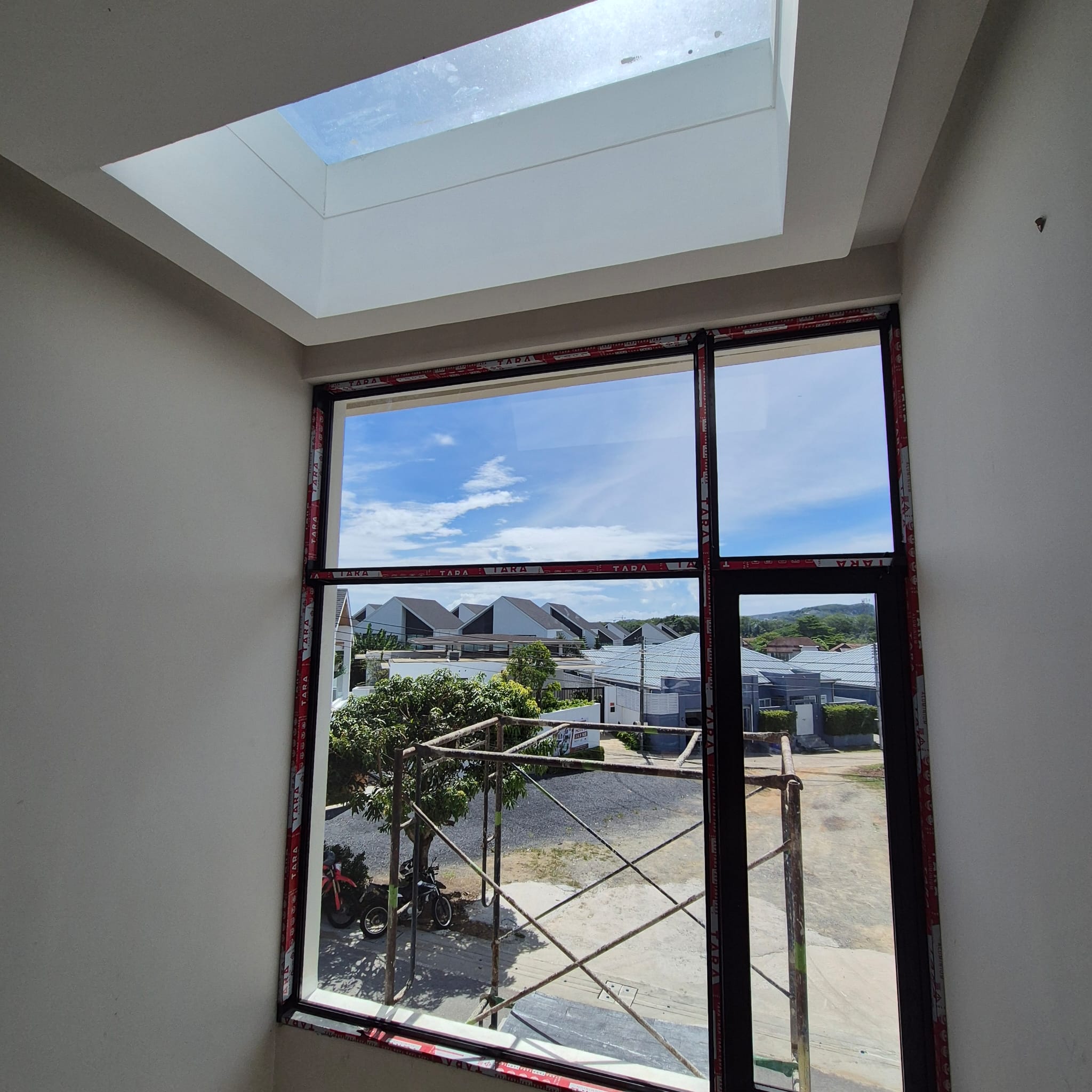 Upper glazing and sky-lit landing