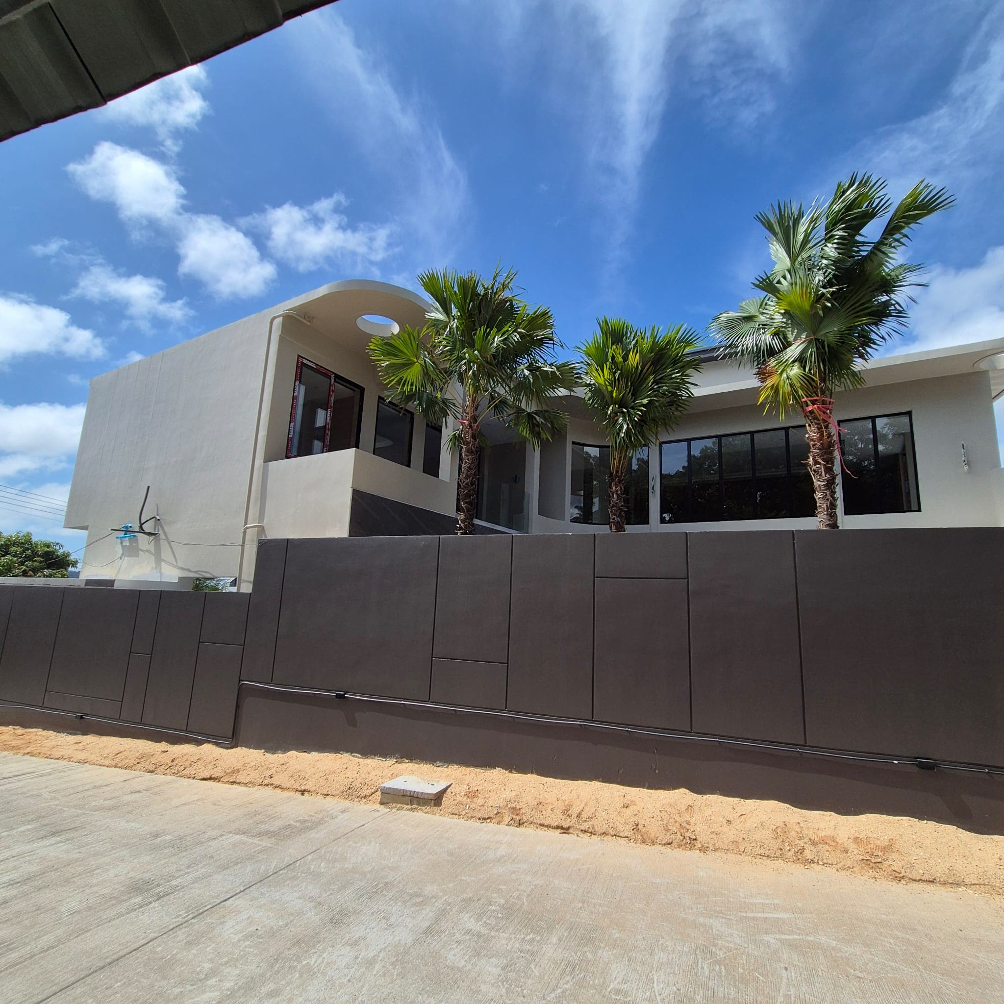 Boundary wall and driveway