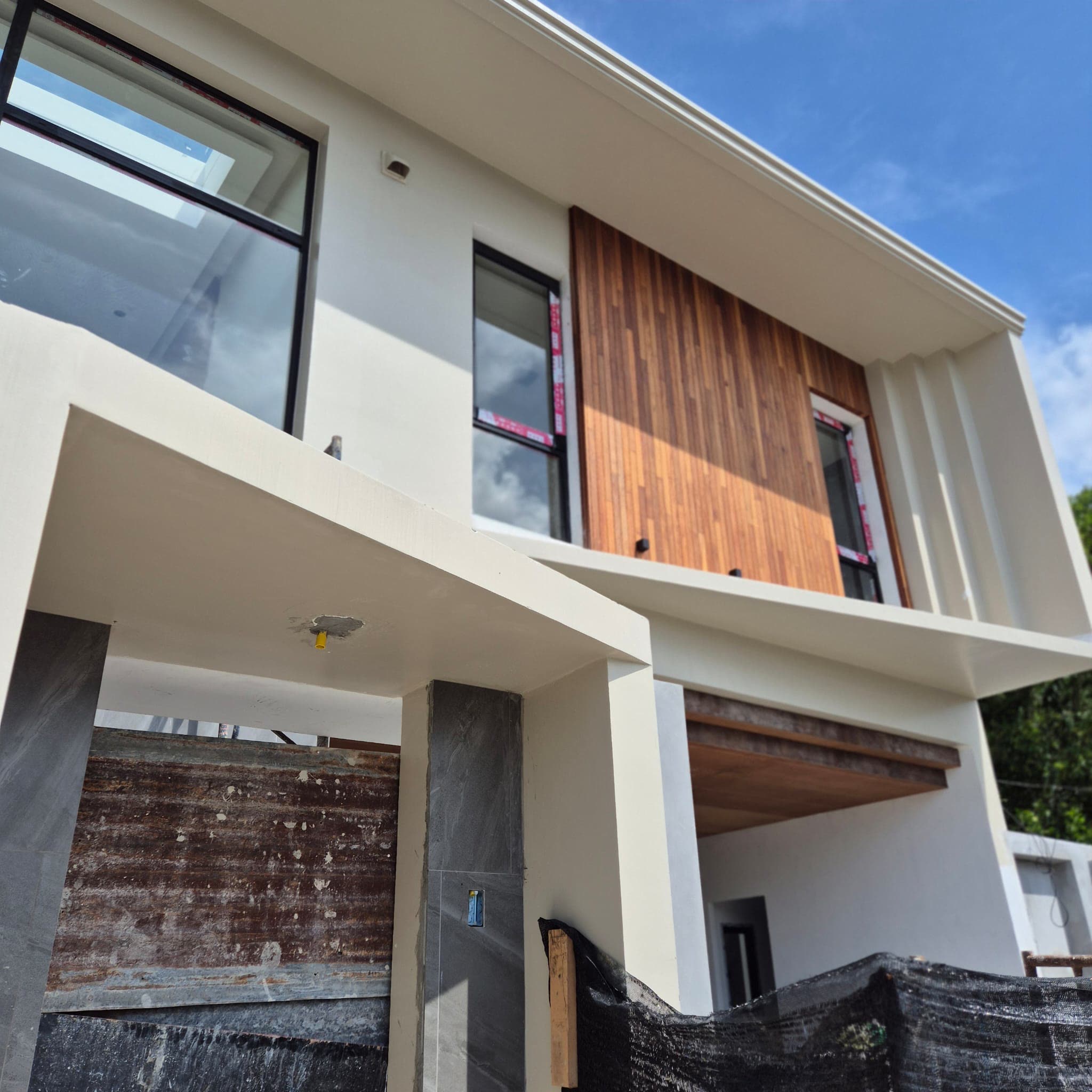 Timber-clad upper facade