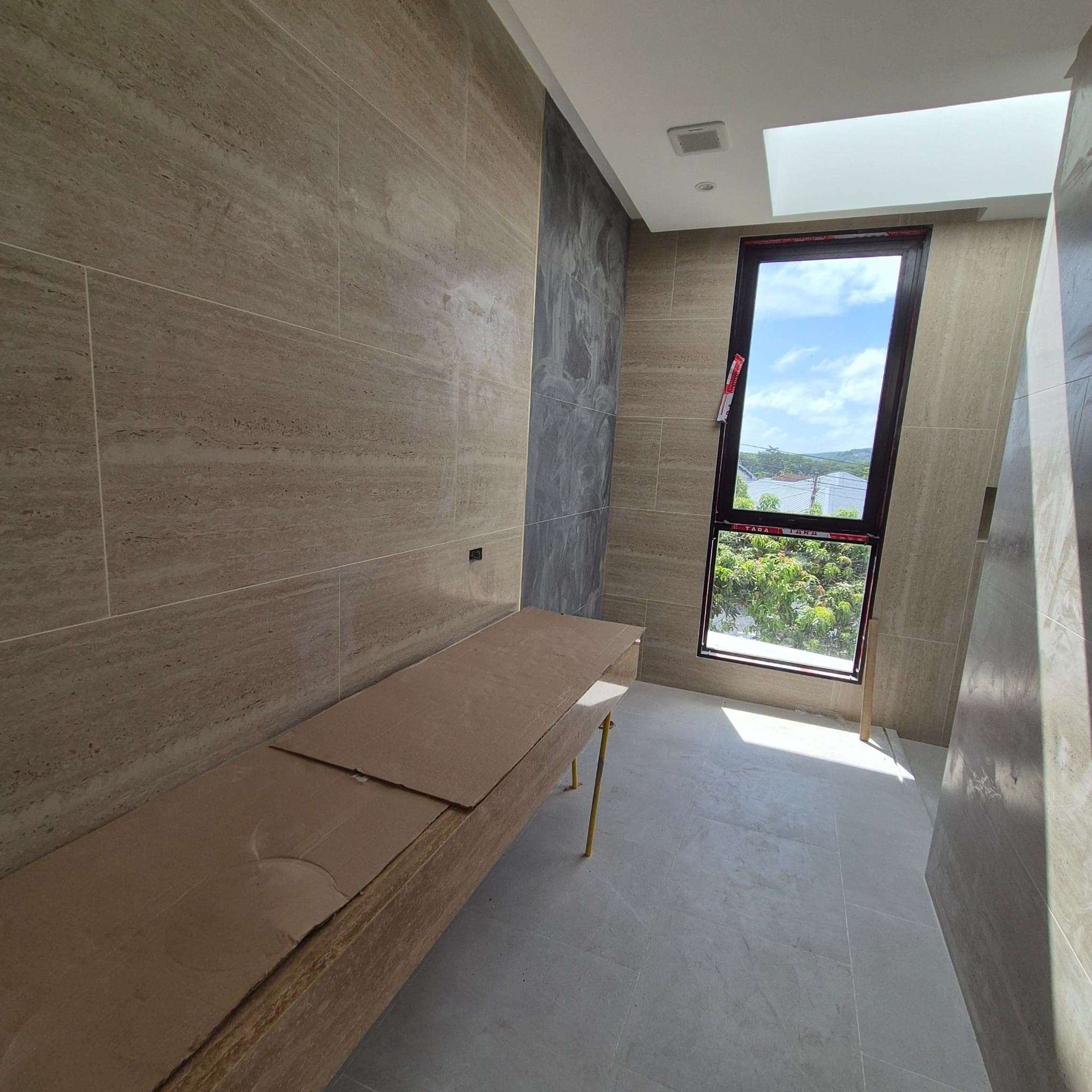 Bedroom window and stone wall